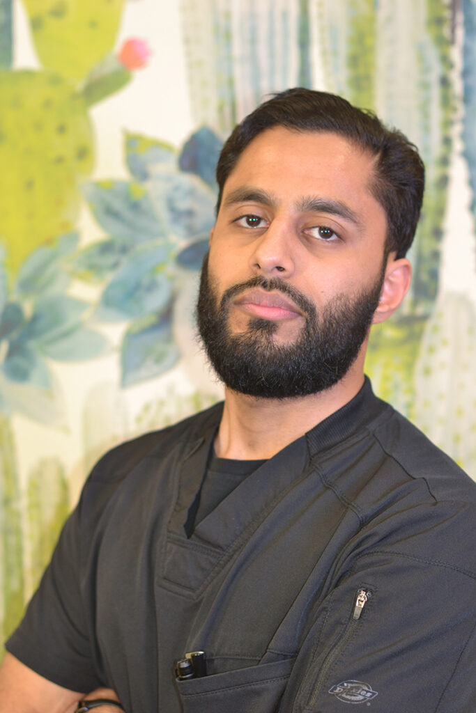 Waleed, dental assistant at Apollonia Dental, supporting holistic and metal-free care under Dr. Cody Dunnington